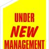 Under new management sign in yellow and red