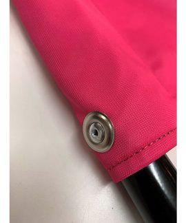 Pink fabric with metal snap button detail