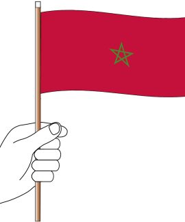 Hand holding the flag of Morocco