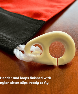 Flag header with nylon sister clip close-up
