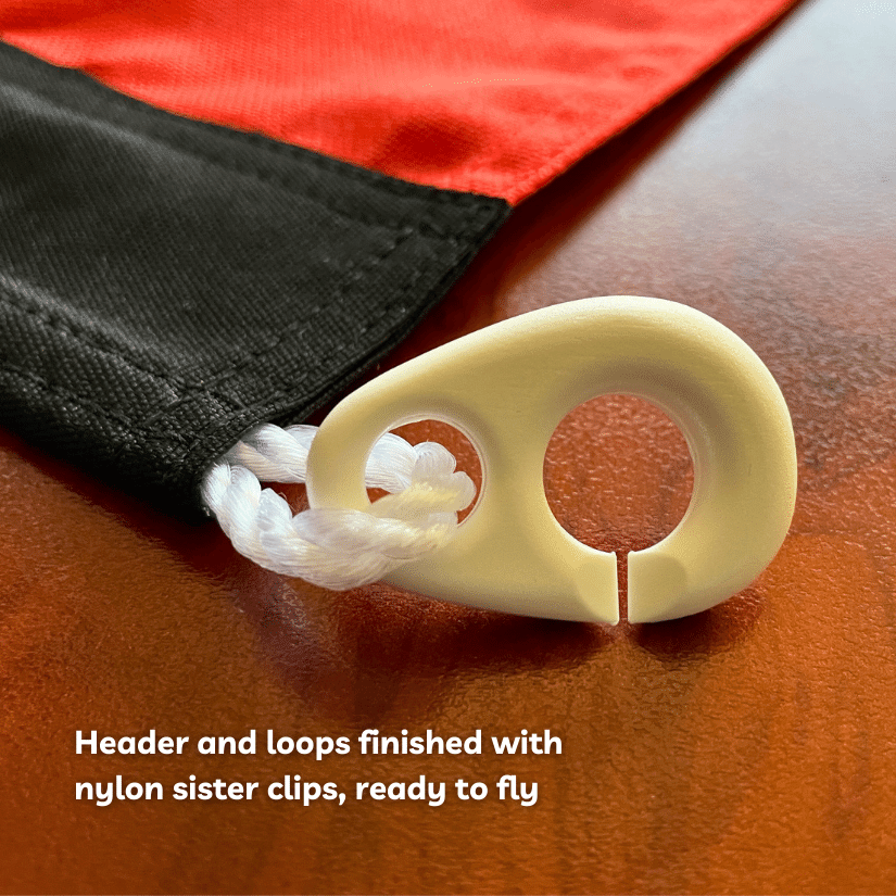Flag header with nylon sister clip close-up