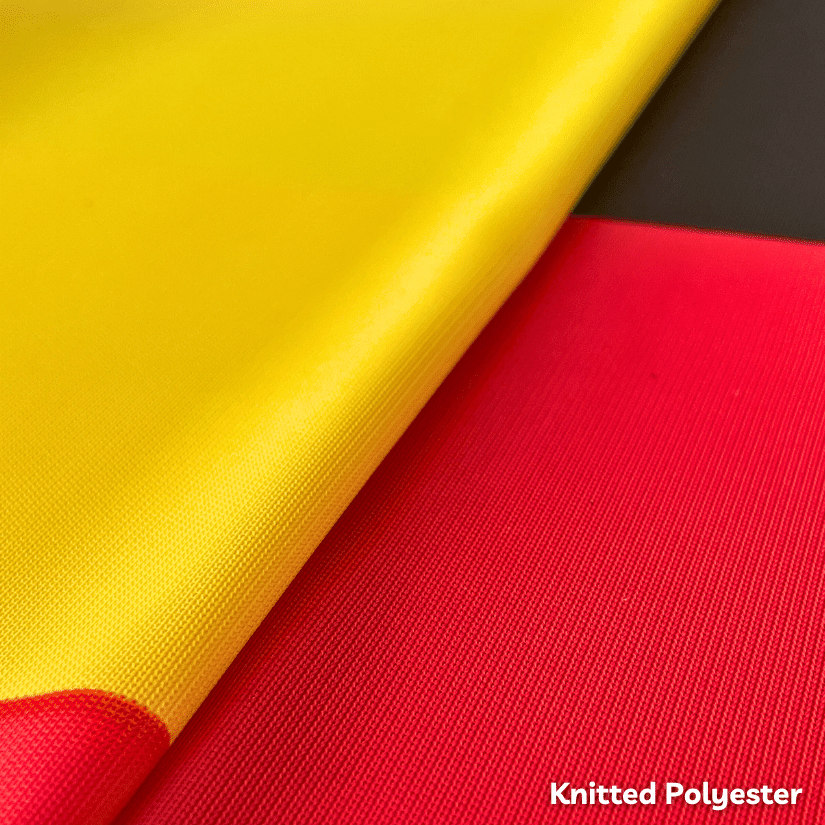 Yellow and red knitted polyester fabric close-up