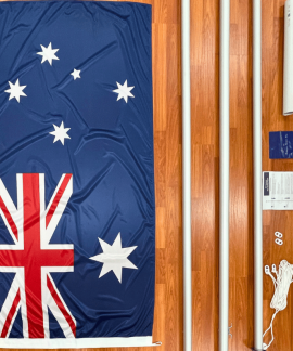 Australian flag with disassembled flagpole kit parts