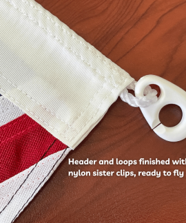 Flag header with nylon clip and stitched edge
