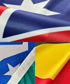 Close-up of colorful folded fabric flags