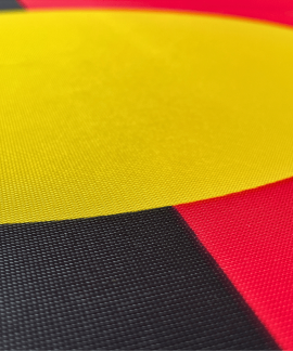Close-up of colorful red, yellow, and black fabric