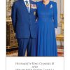 Royal couple posing in formal blue attire