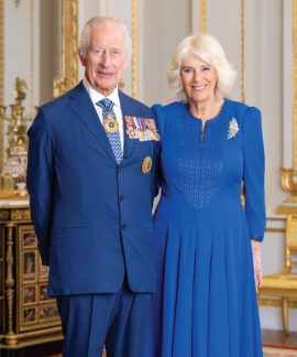 Elderly couple dressed in elegant blue formal attire