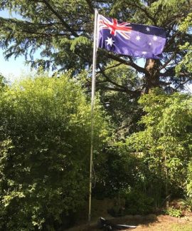 Australian flag waving in a garden